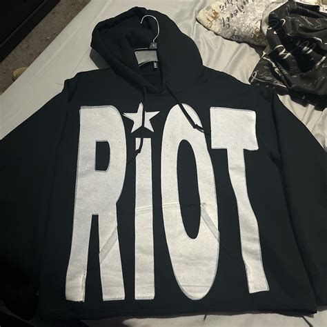 cropped riot hoodie.